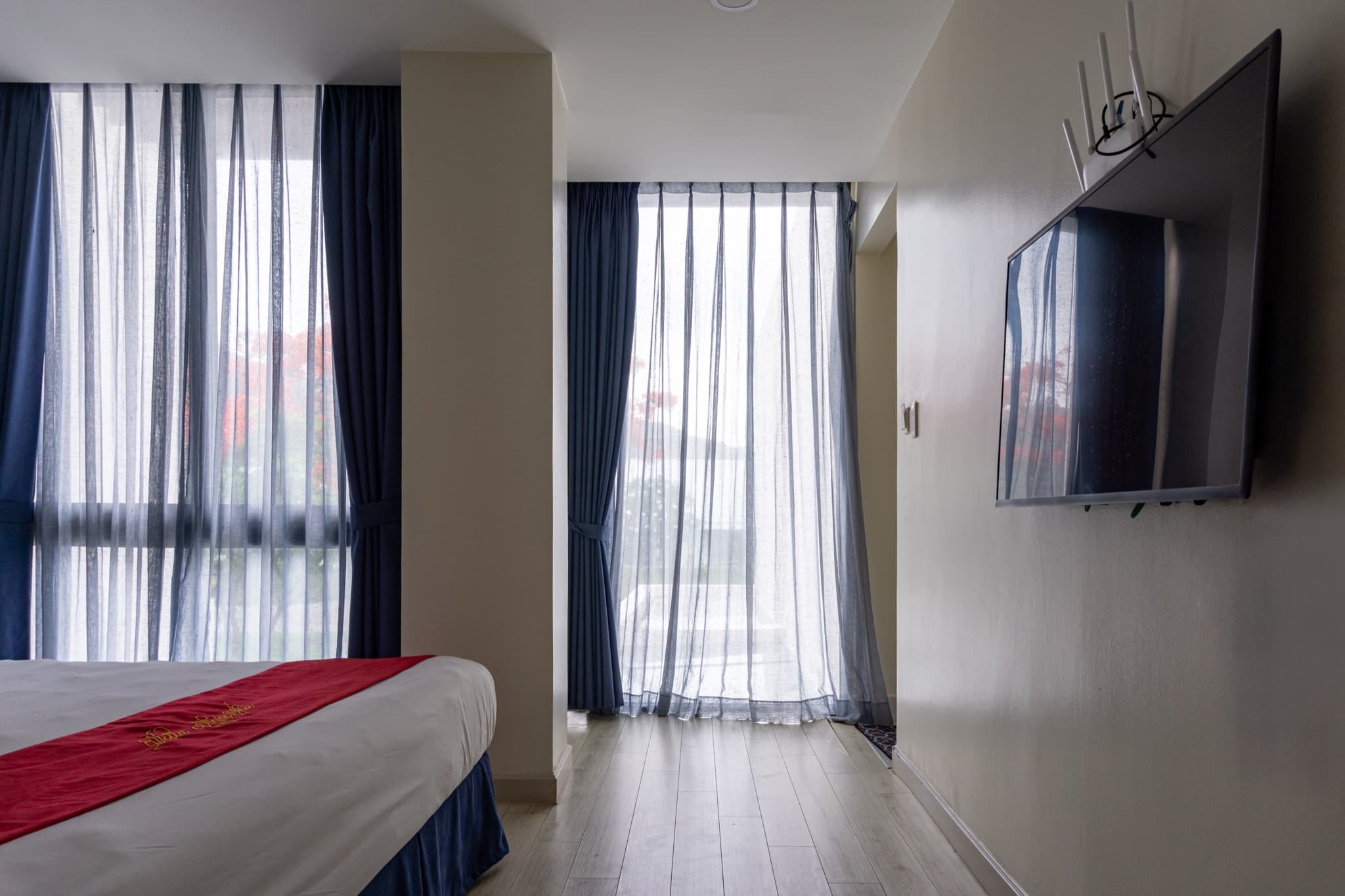 Bedroom four — corner windows on two sides